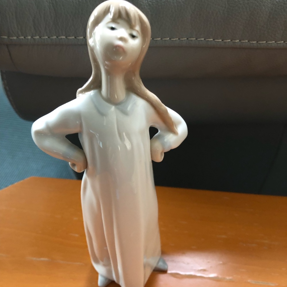 Lladro porcelain girl in nightgown